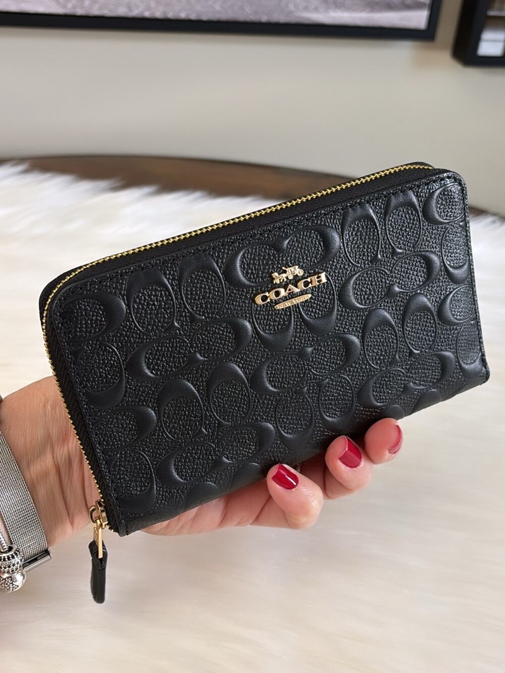 Coach Black Embossed Signature Leather Zip Wallet with Gold Hardware
